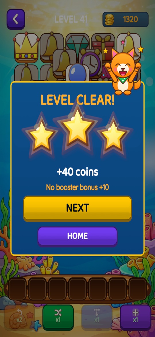The level clear card with three gold stars and Mochi cheering
